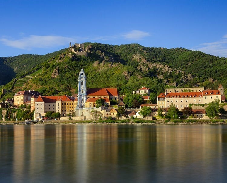https://www.amawaterways.com/Assets/Desktop/Cruises/melodiesofthedanube_MP_IMG_0206blend_Durnsteinday_dailyprogram.jpg